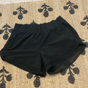 Athleta mesh racer run 4” shorts size M